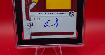 2021 Panini National Treasure Collegiate Amon-Ra St. Brown RPA 38/99 #84